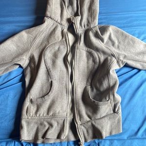Couple girls hoodies with plenty of life left in them lululemon and converse